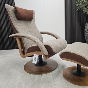 Brunstad Delta Motion lenestol m/krakk i fåreskinn