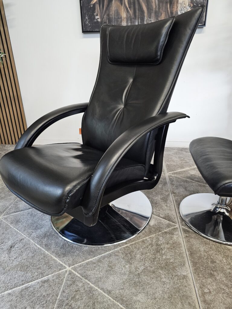 Brunstad Delta Motion lenestol med krakk